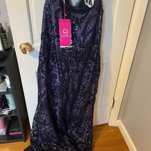 Beautiful navy blue and vibrant purple prom dress. All beaded